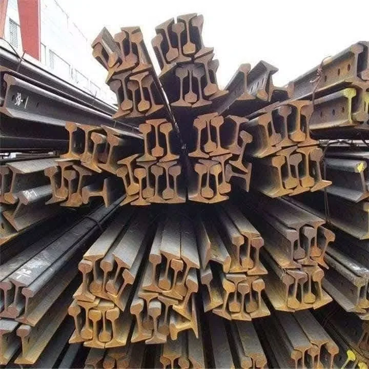 Used steel rail sections stacked for shipment
